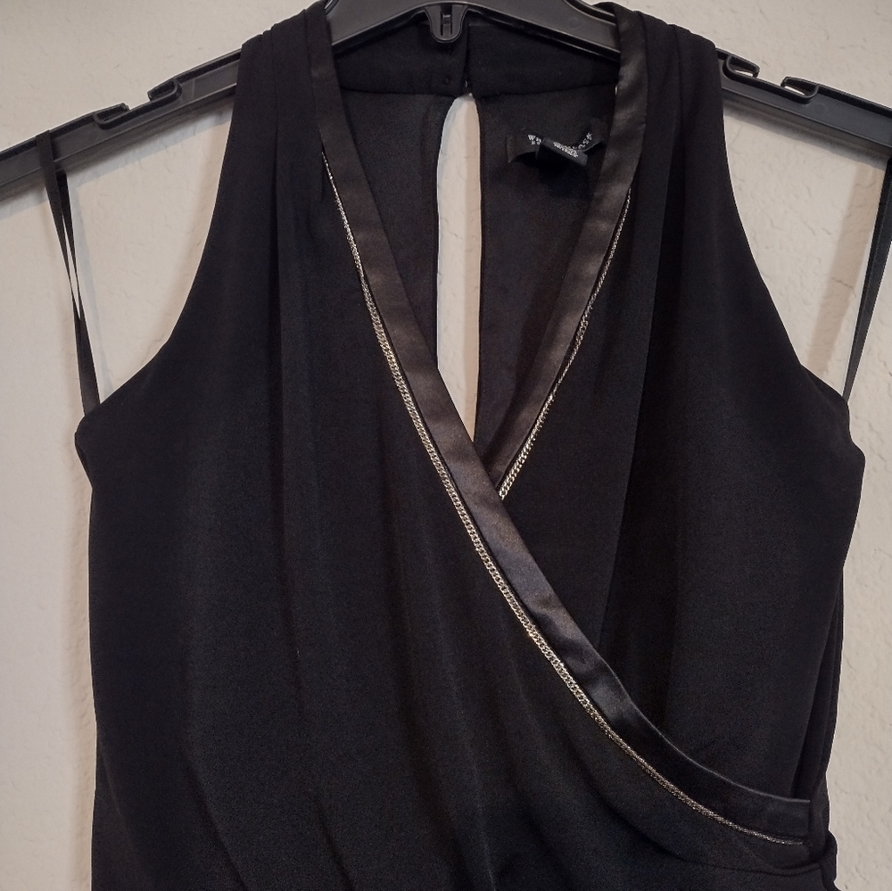 White house black market black jumper with metal detail around neck area, size 0